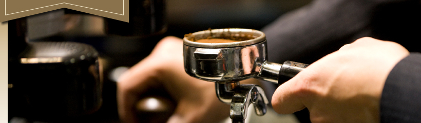 Barrista tamping espresso